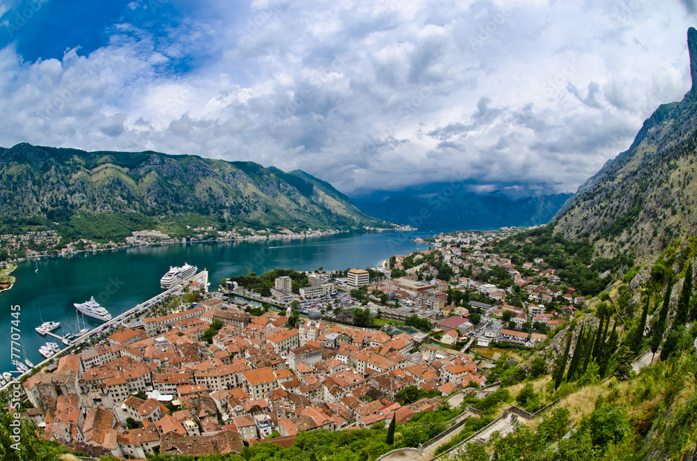 The Kotor bay, old city roofs and port. Adriatic sea beach and m