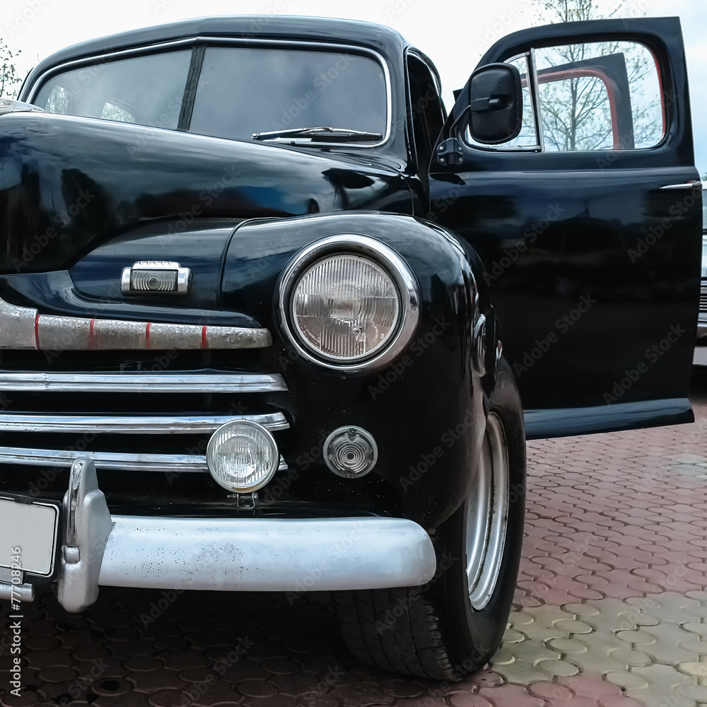 Old retro or vintage car front side