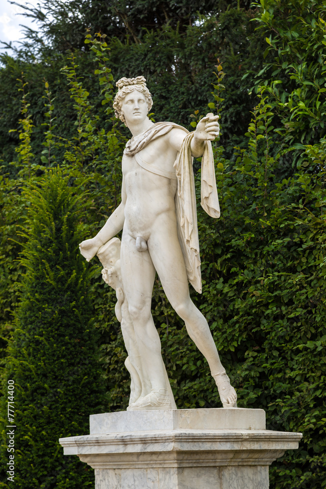 Statue in the park of Versailles palace Statue in the park of Versailles palace
