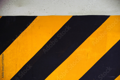 Stripe sign for parking slot in building © TinPong