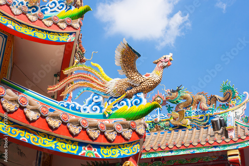 Swan and dragon sculpture decorate on the roof.