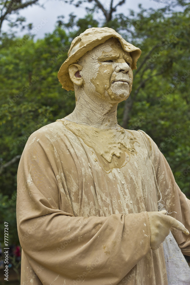 Popular street artist performing a live statue Popular street artist performing a live statue