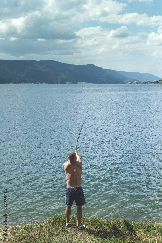 Man on fishing with rod
