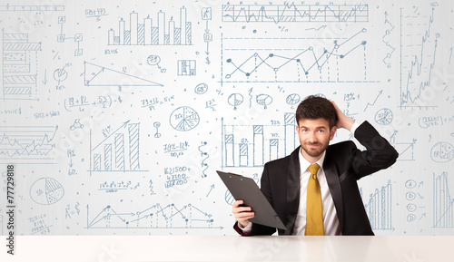 Businessman with diagram background