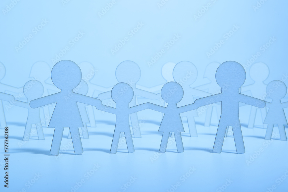 Paper family on blue background Paper family on blue background