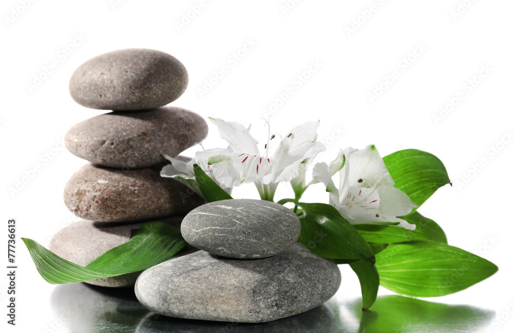 Spa stones with flowers isolated on white Spa stones with flowers isolated on white