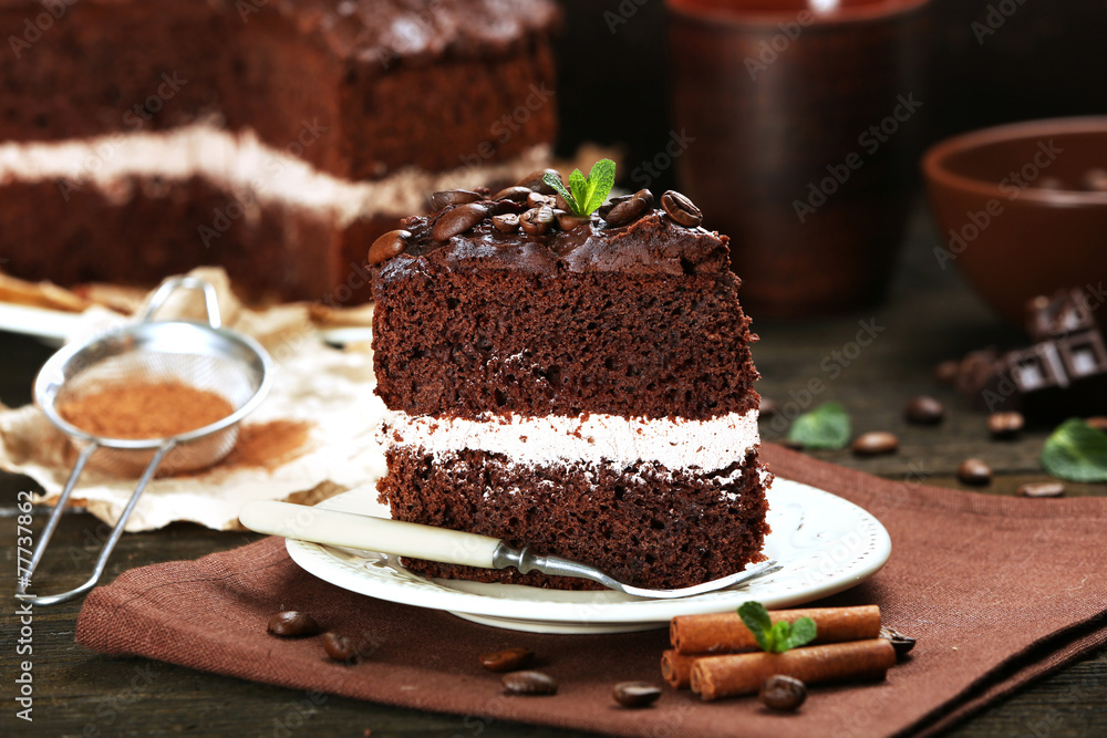 Delicious chocolate cake on table close-up Delicious chocolate cake on table close-up