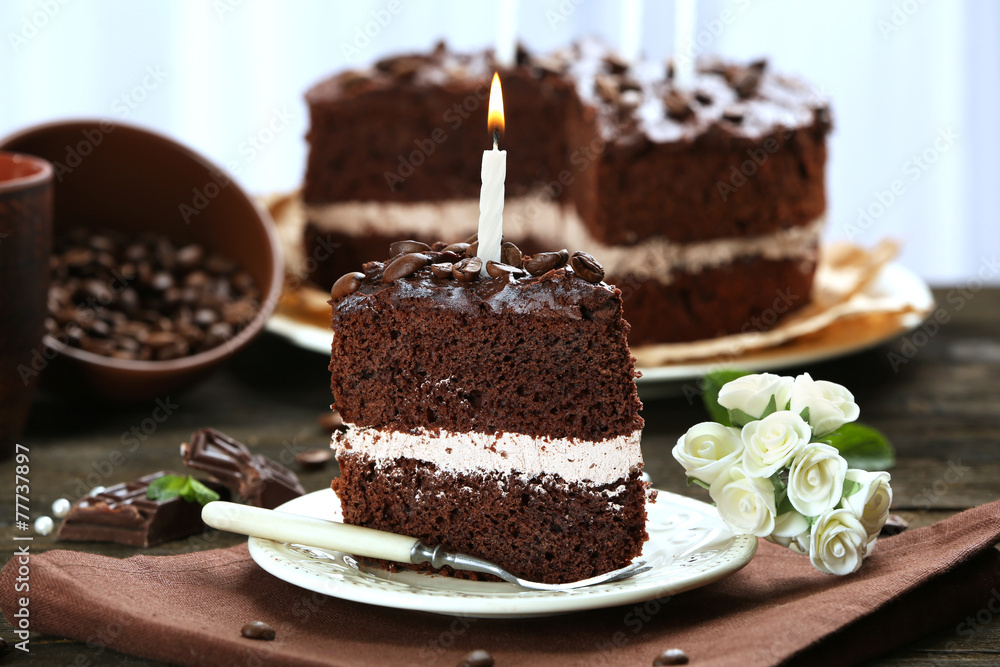 Delicious chocolate cake on table on light background Delicious chocolate cake on table on light background