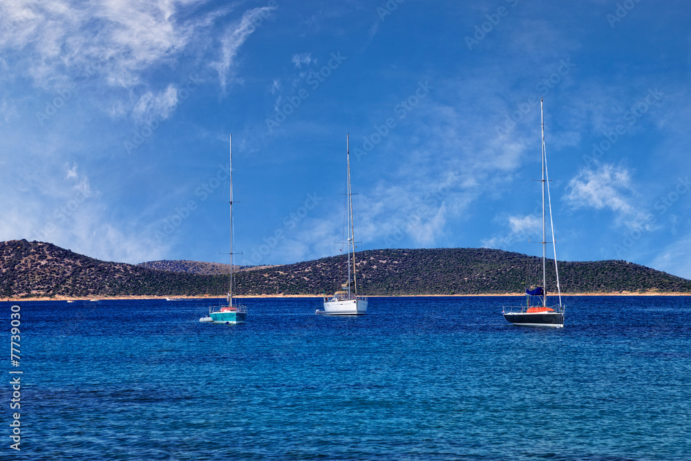 Three sailboats moored Adriatic sea - sea landscape. Three sailboats moored Adriatic sea - sea landscape.
