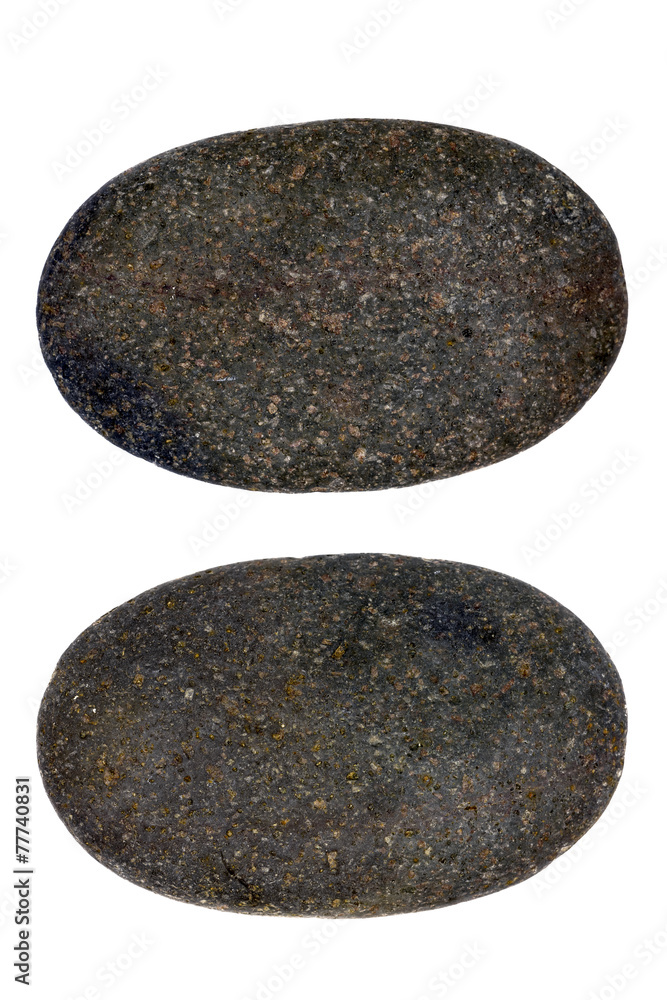 The round stone is isolated on a white background The round stone is isolated on a white background