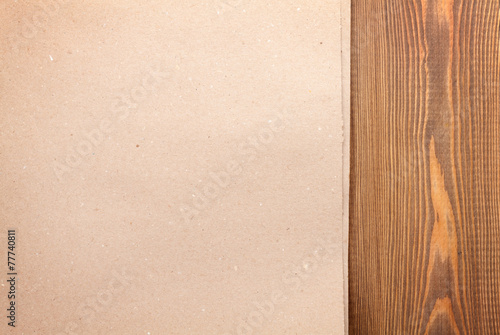 Cardboard paper over wooden background