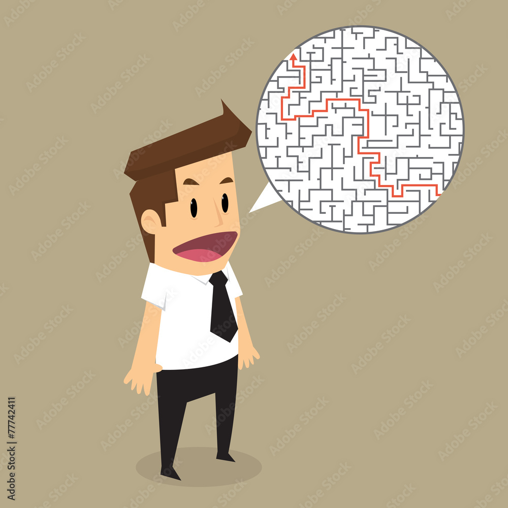 Businessman finding the solution of a maze Businessman finding the solution of a maze