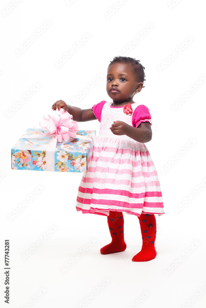 Beautiful black baby girl isolated in white with a gift Beautiful black baby girl isolated in white with a gift