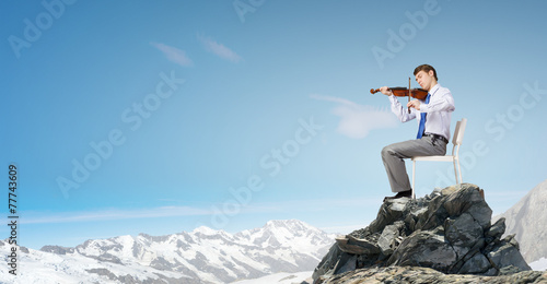 Obraz na plátně Man playing violin