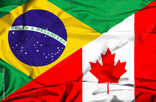 Waving flag of Canada and Brazil