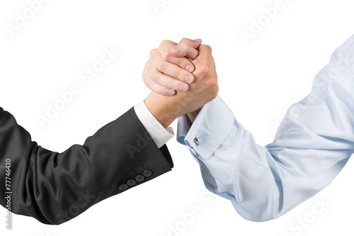 businessmen engaged in arm wrestling