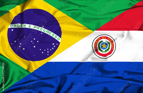 Waving flag of Paraguay and Brazil