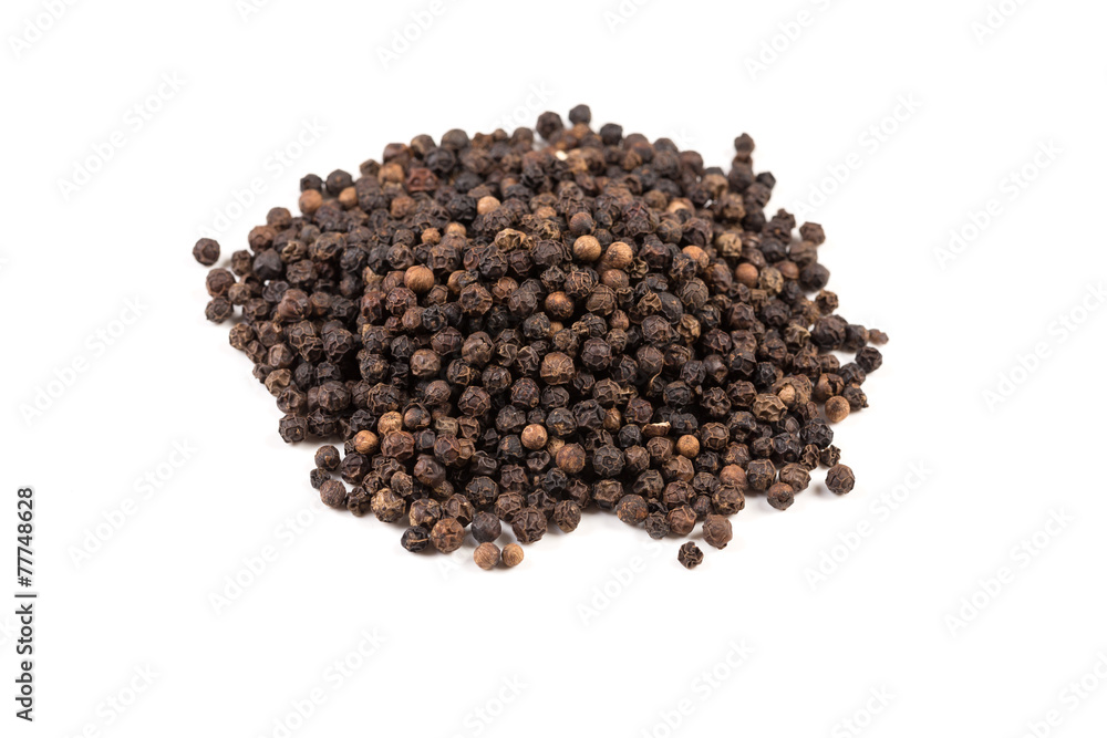 Black pepper was placed on a white background Black pepper was placed on a white background