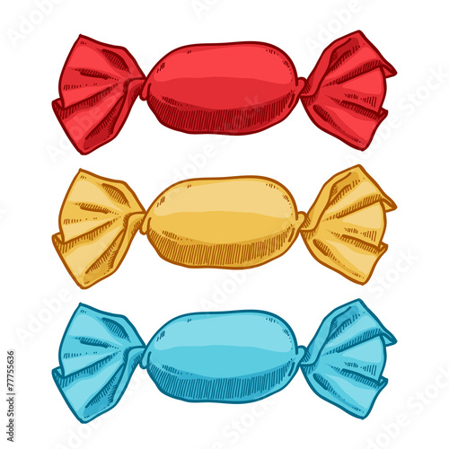Set of candies in wrappers - red, yellow, blue.