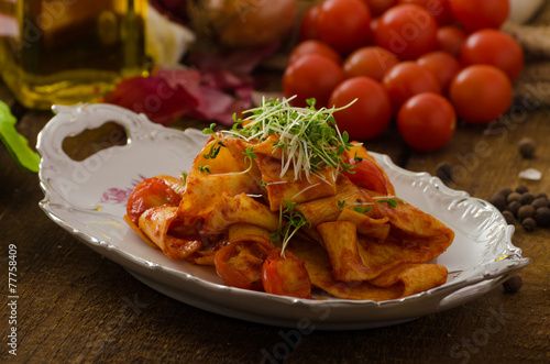 Pasta arrabiata with chilli and garlic organic photo