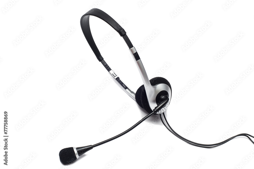 Silver headphone with microphone isolated on white background Silver headphone with microphone isolated on white background