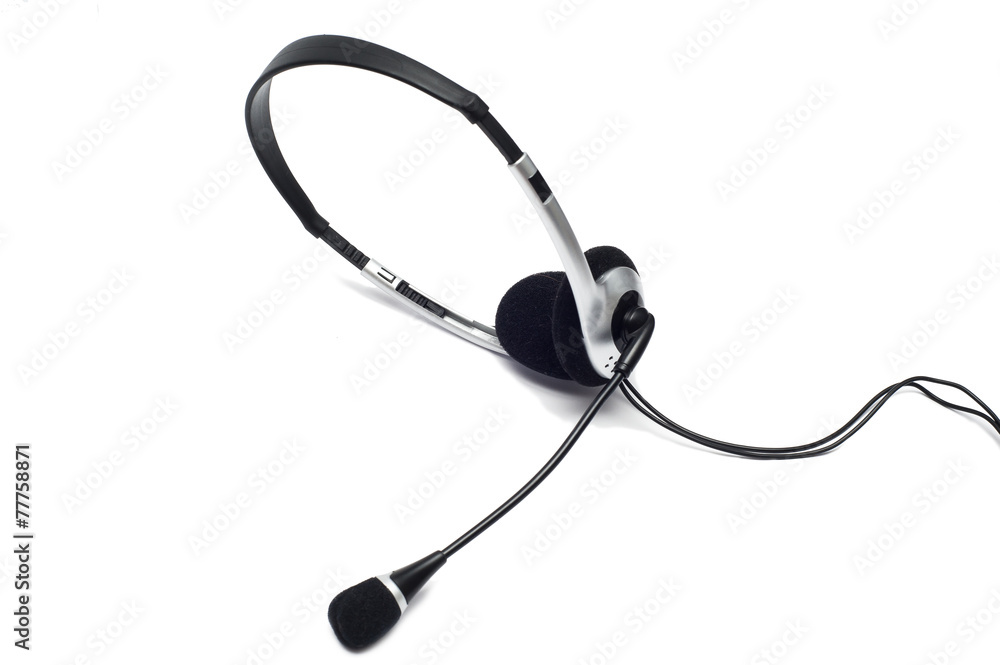 Silver headphone with microphone isolated on white background Silver headphone with microphone isolated on white background