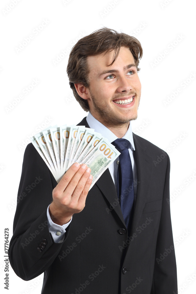 Happy businessman holding money and looking sideways Happy businessman holding money and looking sideways