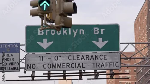 Brooklyn Bridge sign at entrance from Manhattan side in New York City NYC