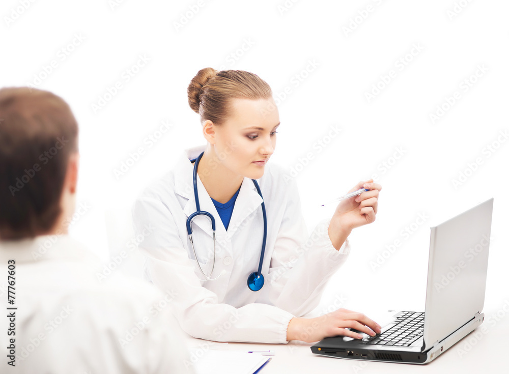 A female doctor with a laptop consulting a patient A female doctor with a laptop consulting a patient