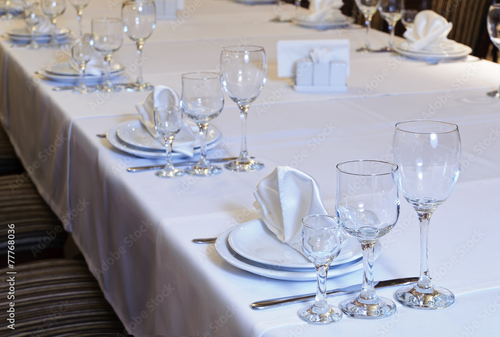 Elegantly decorated table in the restaurant Elegantly decorated table in the restaurant