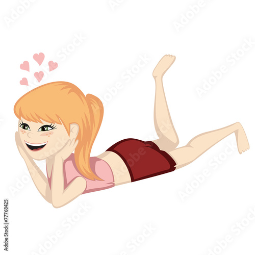 A cute ginger girl is daydreaming on the floor