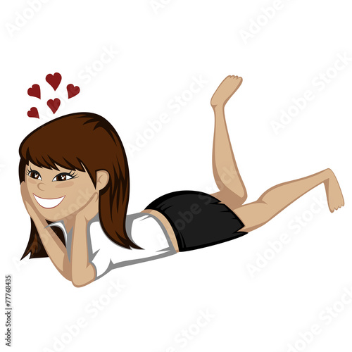 A cute brunette girl is daydreaming on the floor