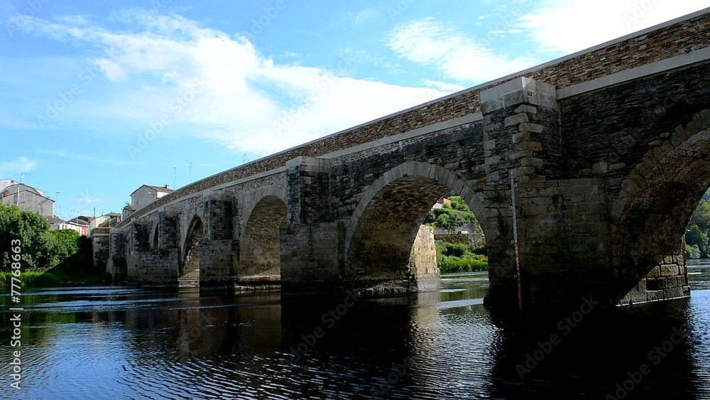 Medieval stone bridge over a river, Lugo, Spain Medieval stone bridge over a river, Lugo, Spain