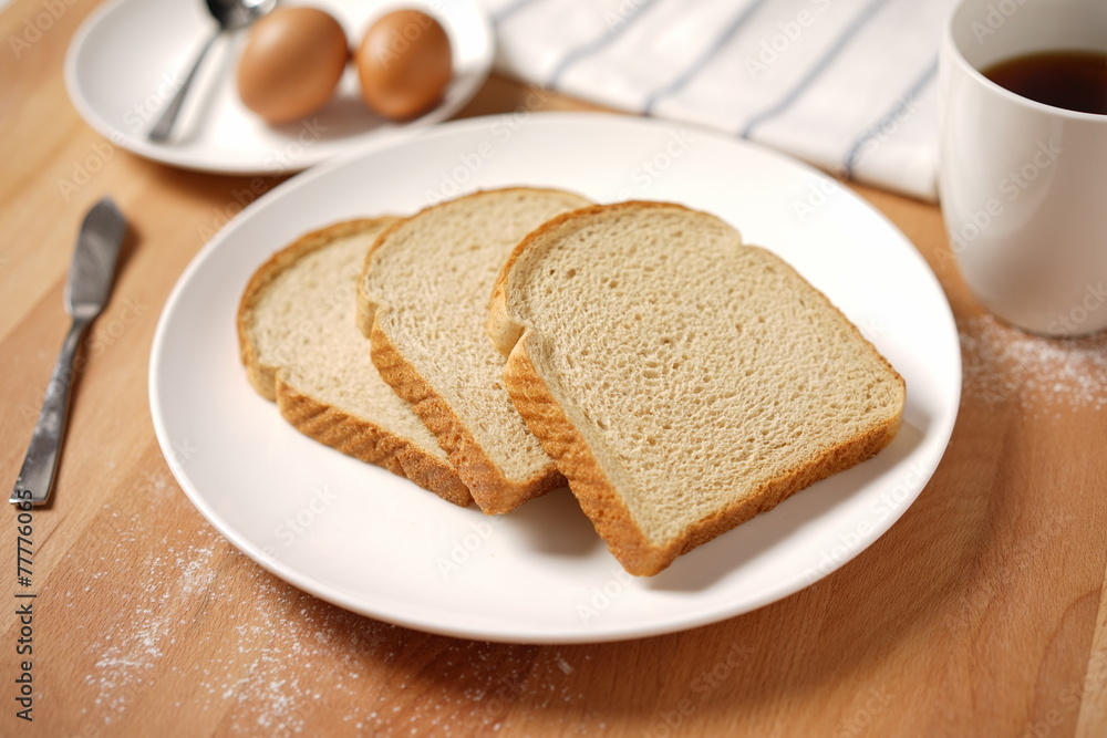 Scene from a breakfast table with staple food Scene from a breakfast table with staple food