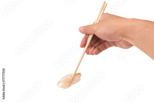 Mackerel sushi with chopstick on White isolated background