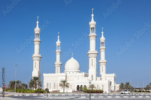 White mosque in Ajman, United Arab Emirates photo