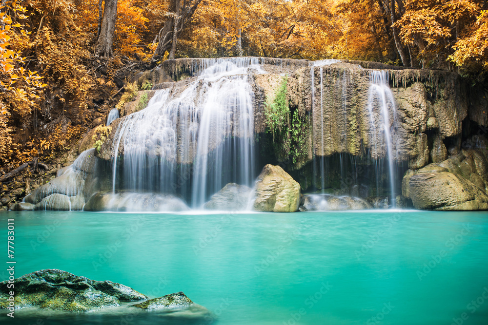 Beautiful waterfall in autumn forest