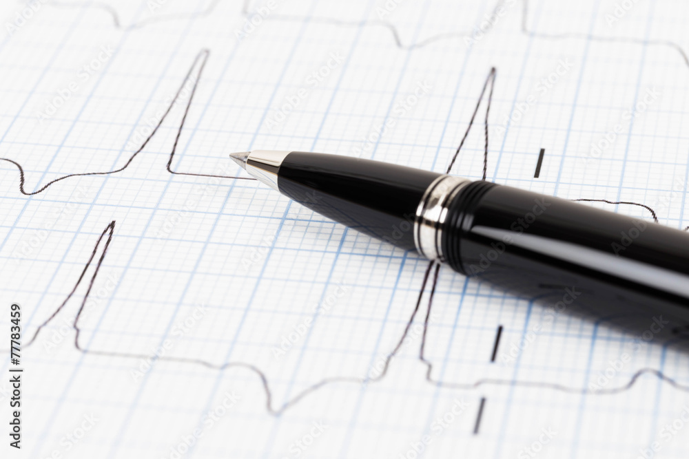 Pen on cardiogram concept for heart diagnostic Pen on cardiogram concept for heart diagnostic