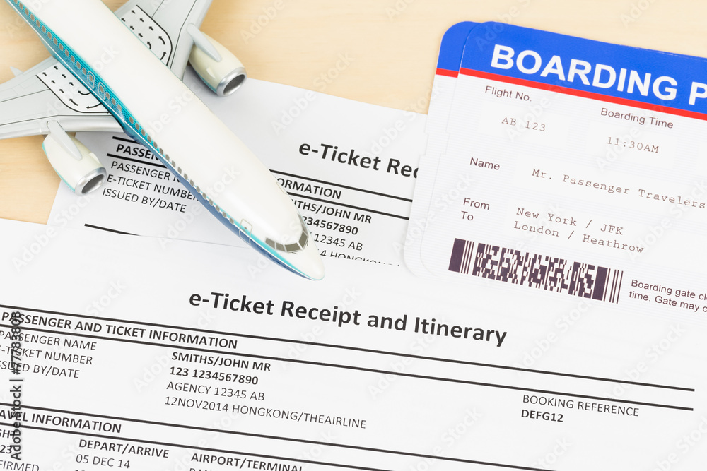 Obraz premium E-ticket with plane model, and boarding pass