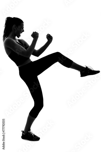 Woman, personal trainer, wearing black sportswear