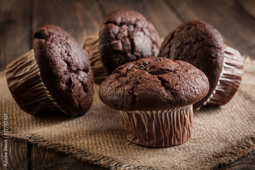 Fototapeta premium Chocolate cake muffins on a table