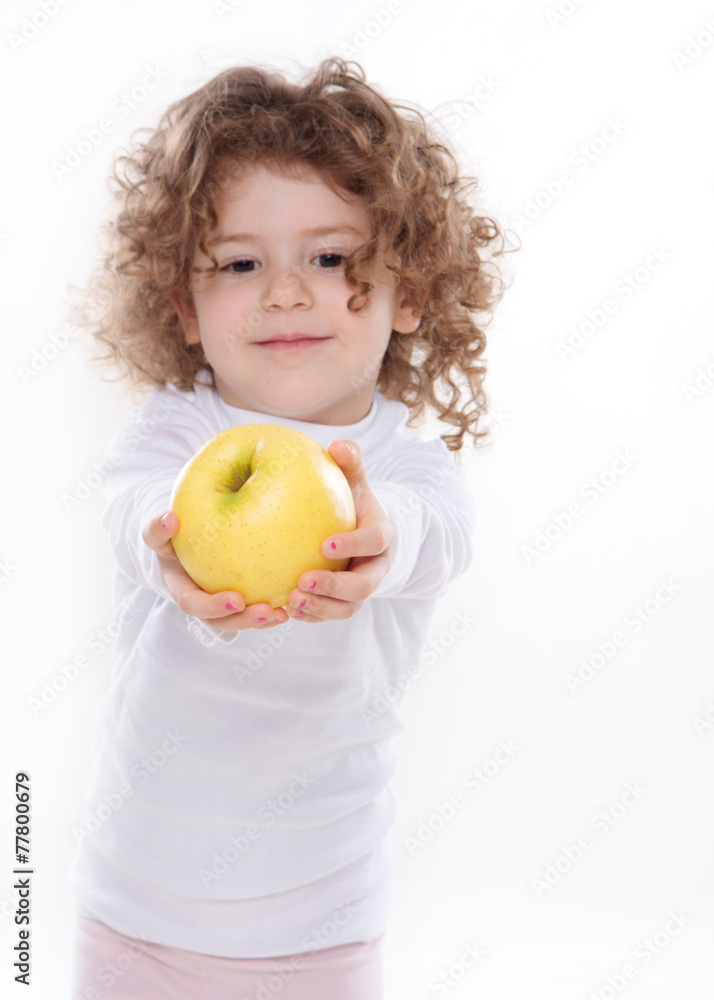the child giving apple on the white background the child giving apple on the white background
