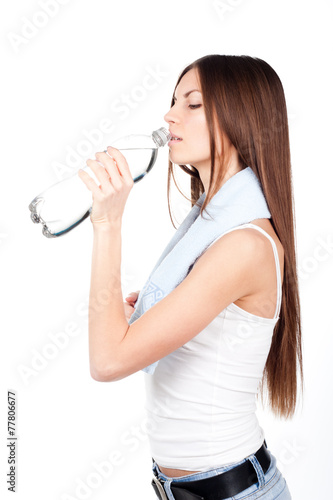 Woman drinking water from a bottle
