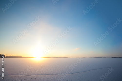 Frozen lake and sunset