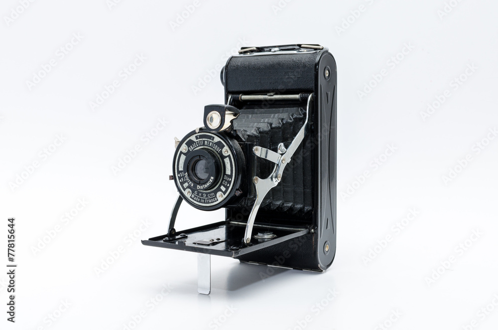 Old vintage camera on white background