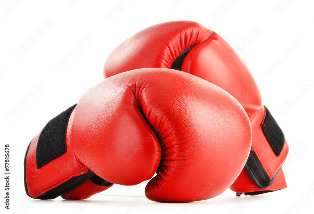 Pair of red leather boxing gloves isolated on white