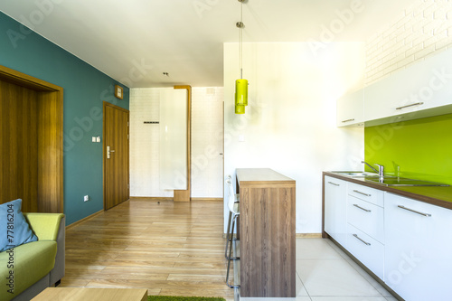 Fotografija Spacious hotel room with kitchenette