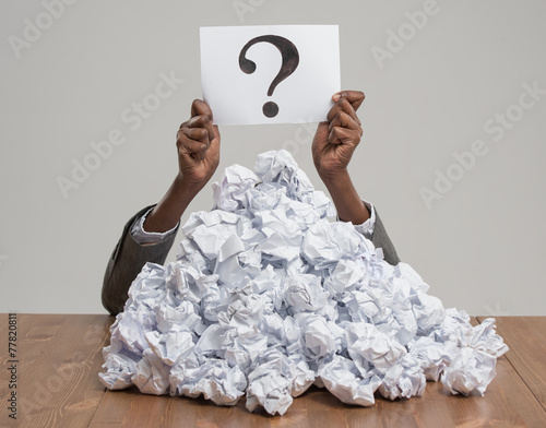 Quadro em tela Business woman under crumpled pile of papers