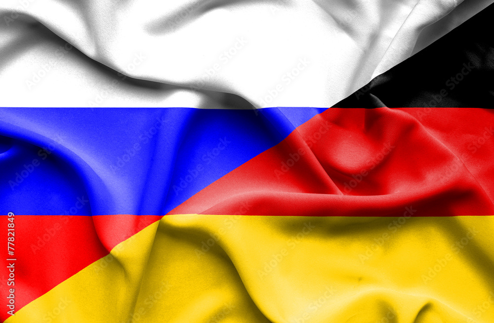 Waving flag of Germany and Russia Waving flag of Germany and Russia
