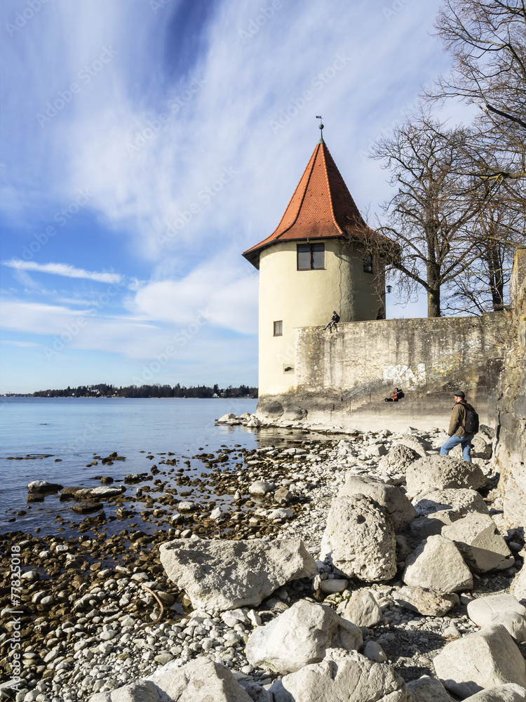 Lake Constance with rocks and tower Lake Constance with rocks and tower